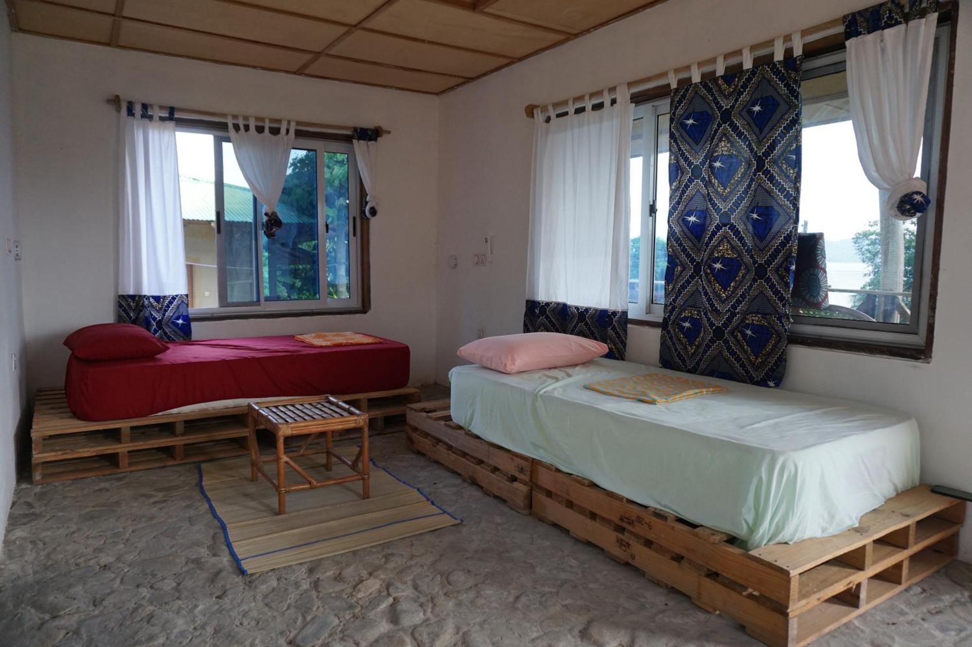 Cocoa Village Guesthouse Obo  Extérieur photo